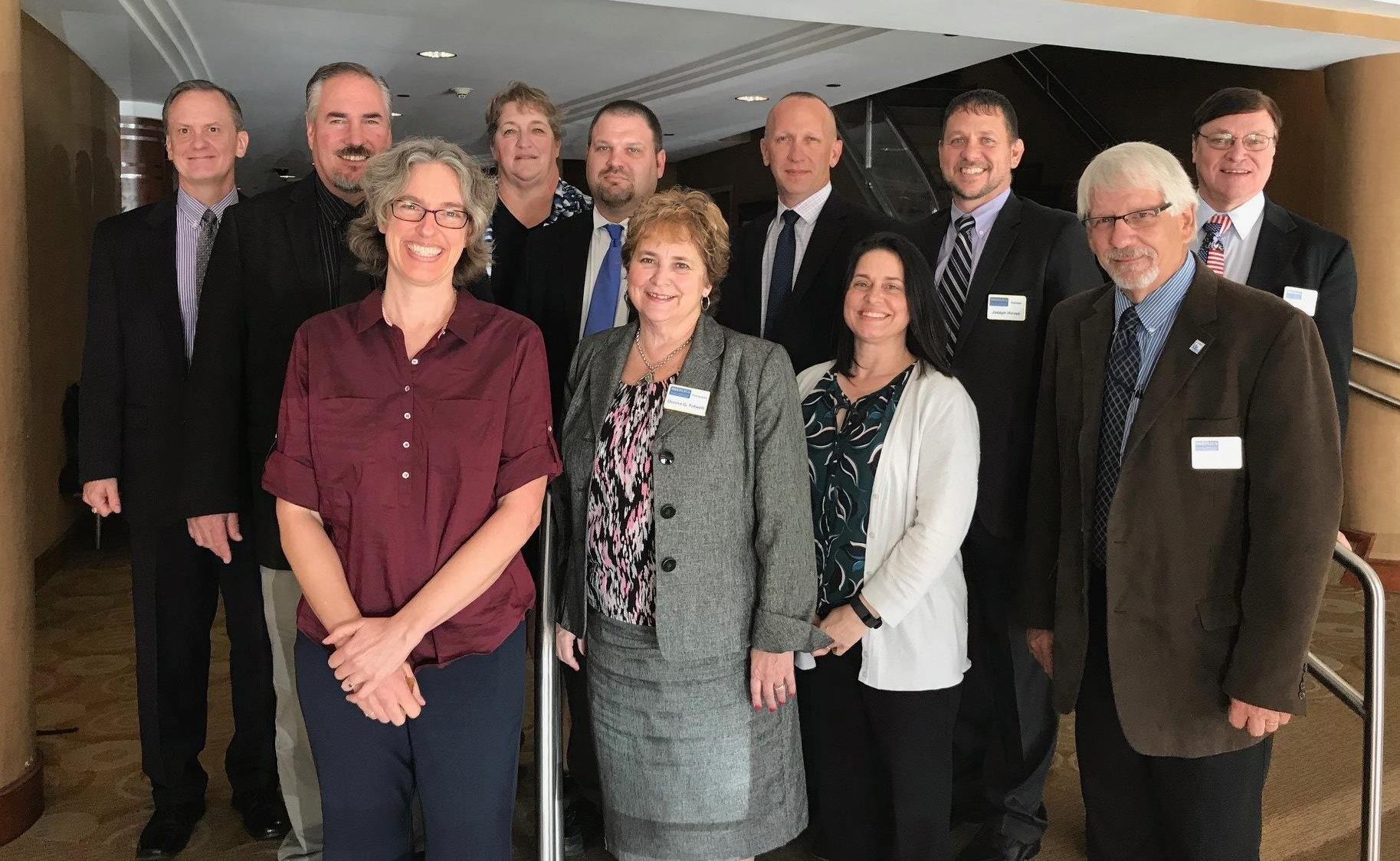 Group portrait of the inaugural Commissioners of the Interstate Commission for EMS Personnel Practice.